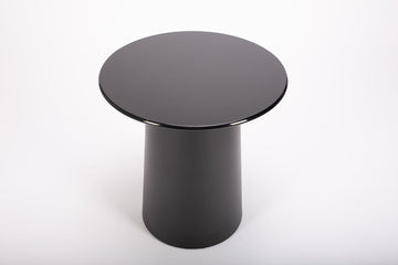 Totem Coffee Table with lacquered metal base and simple circular lines.