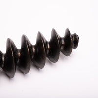 Expanding spiral concrete sculpture in antiqued bronze.