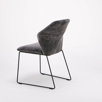 Black New York side chair with painted finish and fully removable covers. Side and back  view.