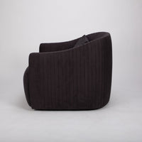 Dark brown fabric Viki swivel lounge chair with tapered arms and tight seat design, side view.