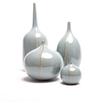 Milo four Vase Collection with vertical overlapping edge.