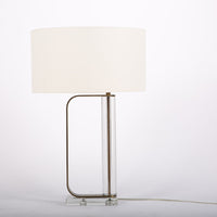 Abby table lamp with antique brass and crystal combined and a white shade.