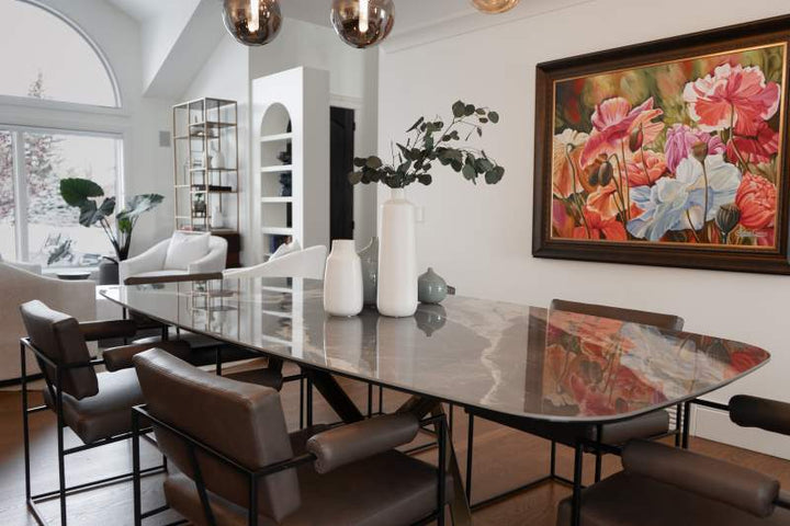 Beautifully designed dining area with contemporary furniture and art
