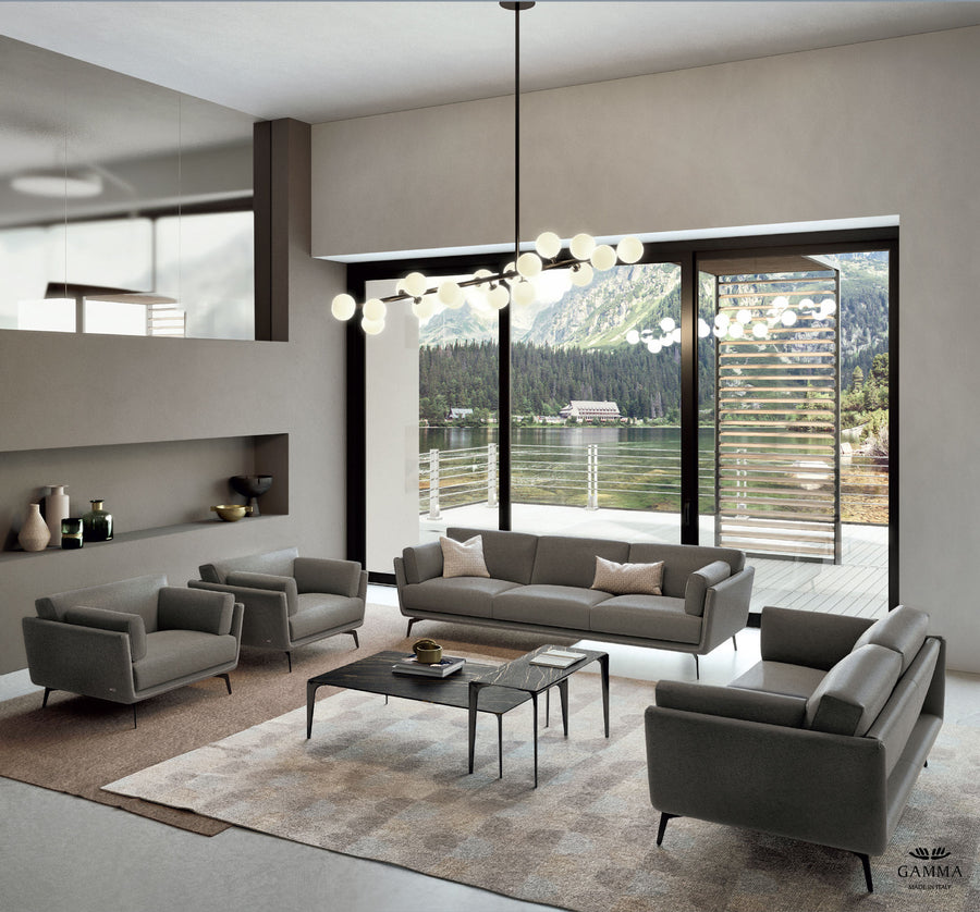Ralph leather sofa, loveseat and two chairs placed in a room in a house beside a lake.