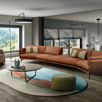Orange leather Ralph 5 seater sofa placed in a modern living room.