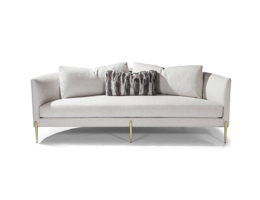 White Decked Out sofa with curved back and metal legs.