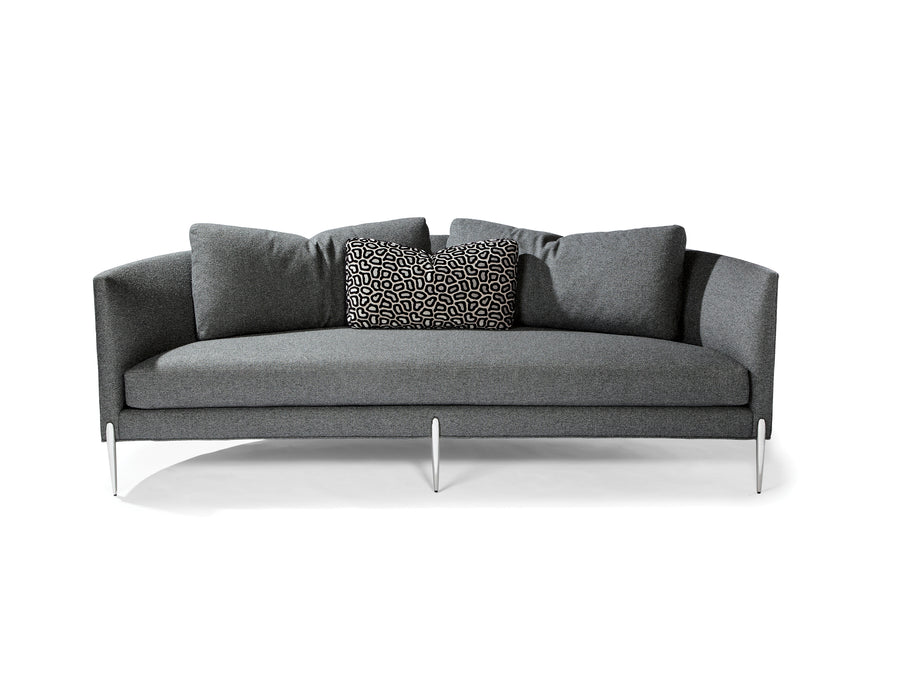 Grey Decked Out sofa with curved back and metal legs.