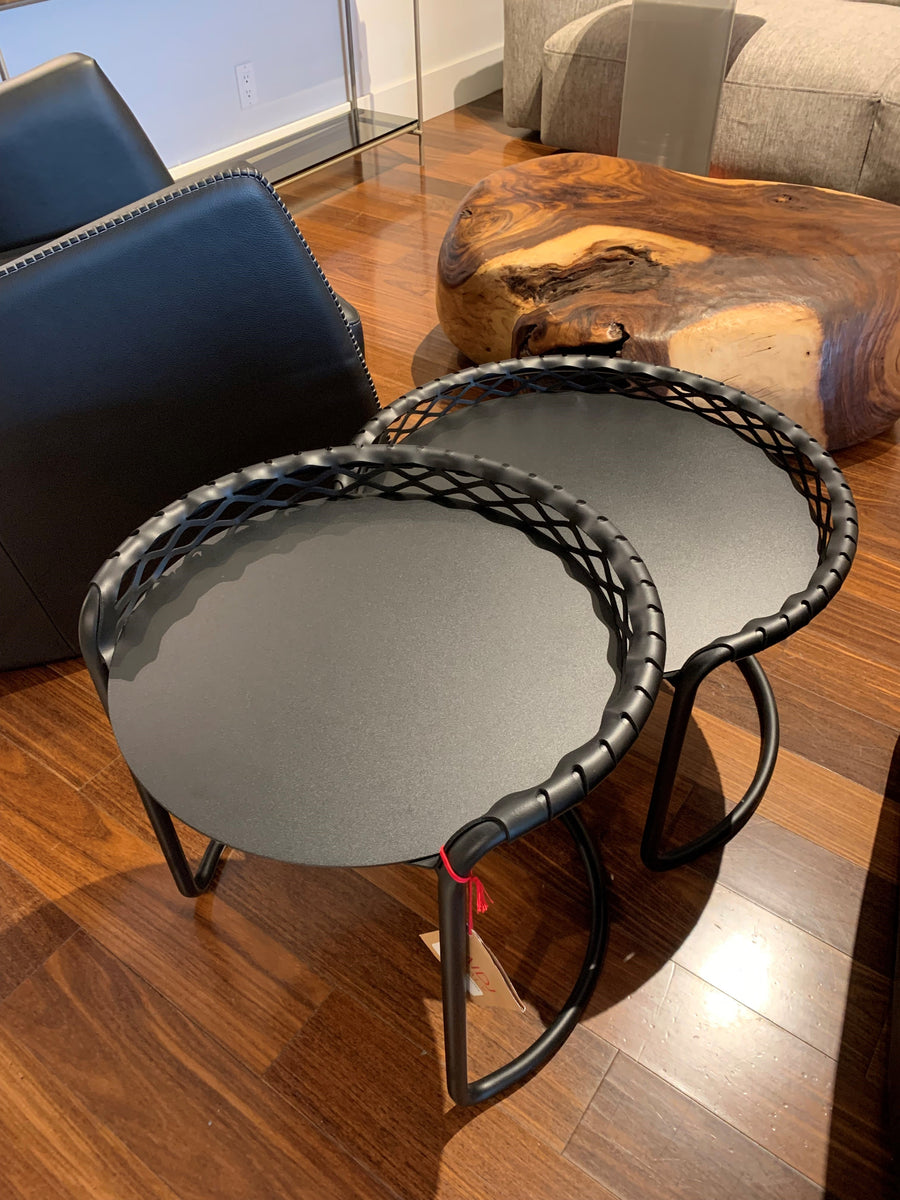 Two black P47 H50 coffee tables with transversal look and chromatic customization.