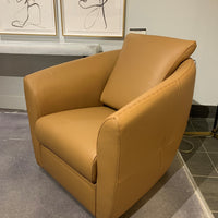 Orange leather bubble swivel chair.