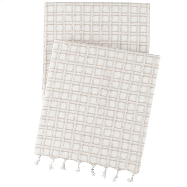 White Caldwell Plaster Throw Blanket with soft texture contrasts.
