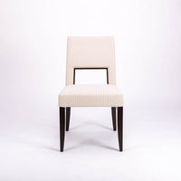 Blues Side Chair in white color fabric and dark legs, with open back, full front view.