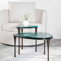 Reuleaux small Cocktail Table with rounded, asymmetrical green top and elegantly tapered legs.