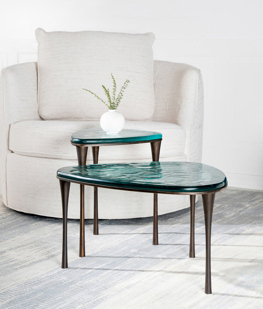 Reuleaux small Cocktail Table with rounded, asymmetrical green top and elegantly tapered legs.
