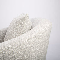 A white mid sized Holly Swivel Chair with Premium down and feather cushioning and wood trim base. Closed up side view.