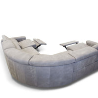 Ash Ermes sectional with channel tailoring on the outside arm and perimeter stitching feature on the arms, bronze metal legs, and battery operated reclining mechanism. Back view.