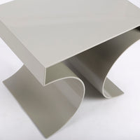 Kinkou Far East accent designer table done in silver metal with contemporary artful design. Top view.