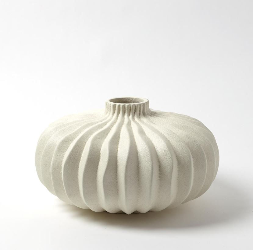 White, hand-crafted Lithos Vase with irregular ridges that accentuate the three organic shapes.