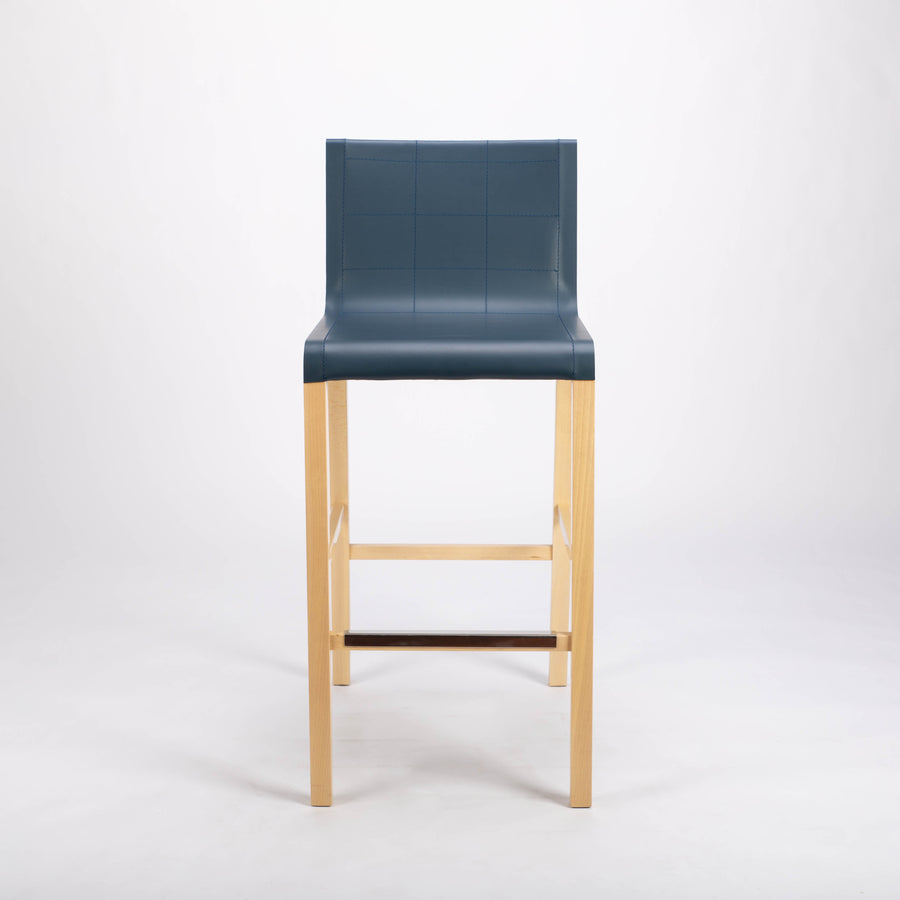 Tosca Barstool with blue leather seating and solid beechwood construction. Front view.