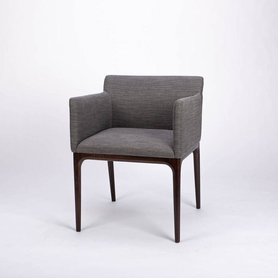 A grey four seasons dining chair crafted from solid beechwood. Front and side view.