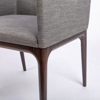 A grey four seasons dining chair crafted from solid beechwood. Closed up bottom view.