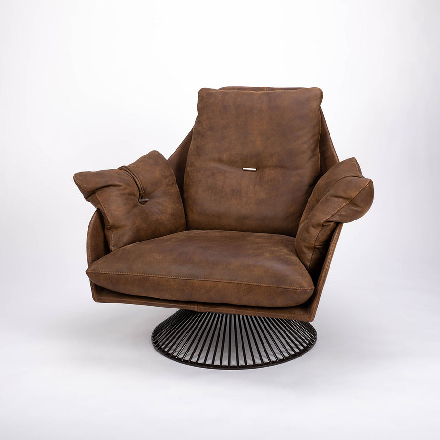 A brown modern and luxury leather armchair with glossy spoked base anchors. Front and side view.