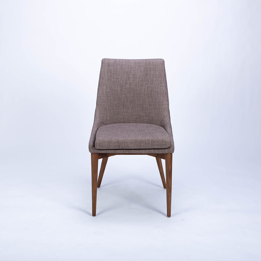  Calais Side dining chair with curved back and arms and the solid ash frame. Front view.