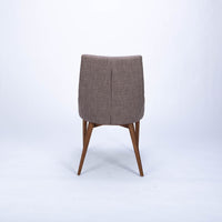 Calais Side dining chair with curved back and arms and the solid ash frame. Back view.