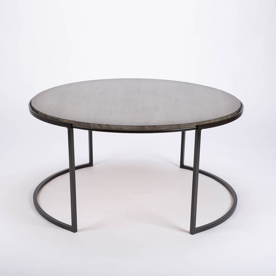 Taylor Cocktail Table with spare, elegant lines with maple top and metal base.
