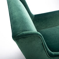 Green fabric Twiggy lounge chair with elegant leg detail in polished steel. Closed up top view.