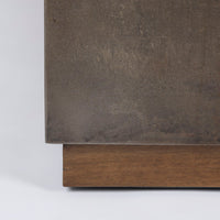 Brown Cabo Cocktail Table block shaped in an abstract metal material, closed up view.