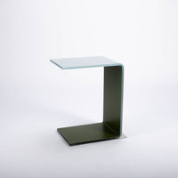 Two-toned bent glass coffee table with glued mat stainless steel plate.