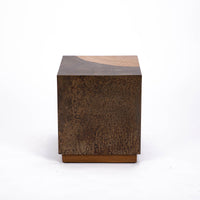 Kobe Low cube side table with wooden look made from ollection of organic designed metal and “Toasted Yukas” wood species from South America.