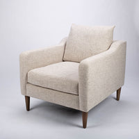 A white fabric Tea lounge stocked chair, front and side view.