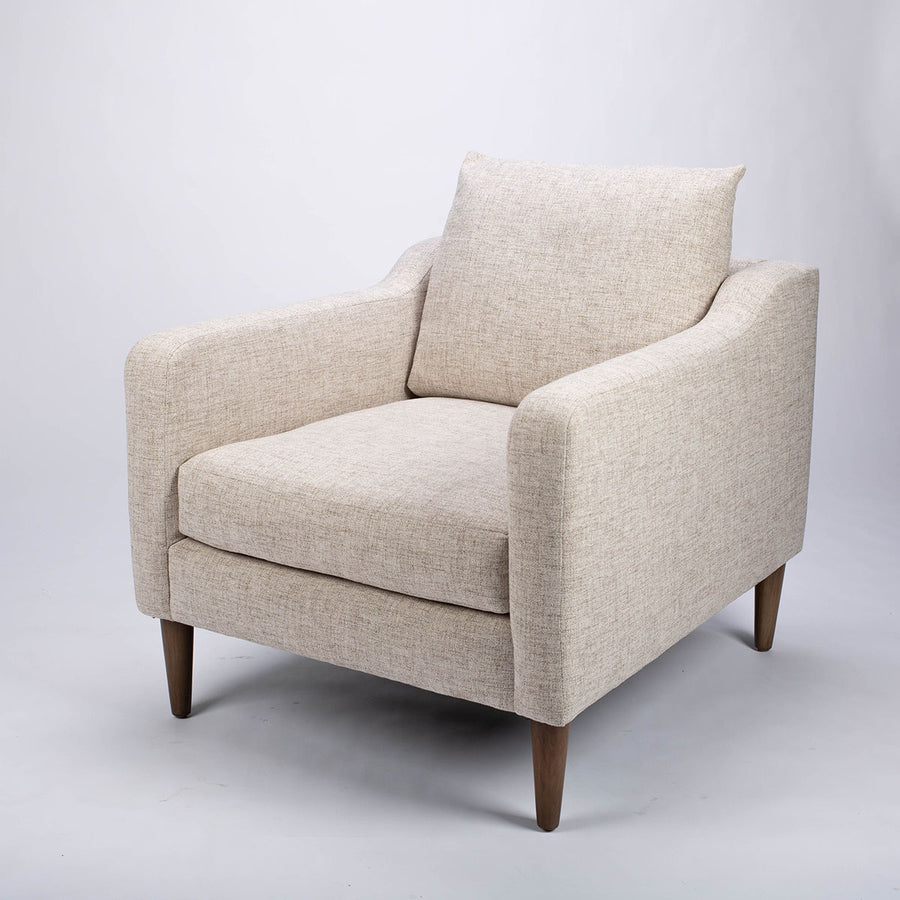A white fabric Tea lounge stocked chair, front and side view.