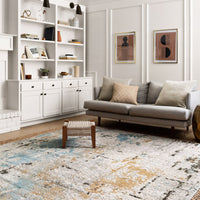 Alchemy Stone + Slate Area Rug placed in a trendy living room.