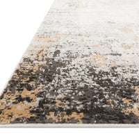 Alchemy Granite + Gold Area Rug with colorful details and high/low pile combined with a playful color palette.