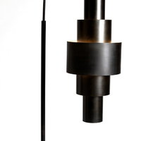 Black Babylon Floor Lamp with formed of bold concentric circles and with floor switch on cord.