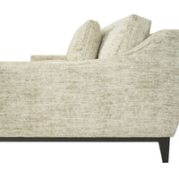 Classy Boulevard sofa with single seat cushion in foam, 8” wide arms, and two large back cushions. Side view.