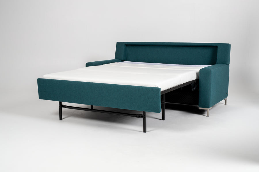 American Leather Bryson Two Seat Comfort Sofa Bed in blue color, front and side view, pulled-out.