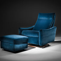 A blue leather Ontario modern rocking recliner chair and ottoman.