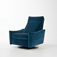 A blue leather Ontario modern rocking recliner chair.