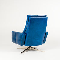 A reclined blue leather recliner chair with four star base, back view.