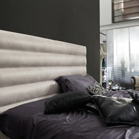 Wafer Nite Modern leather-upholstered bed with a high backrest and horizontal topstitched strips.