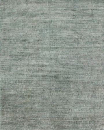 Hand-loomed Elliot Aqua + Slate Area Rug from viscose from bamboo and wool.