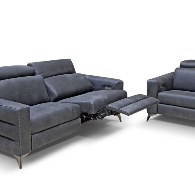 Grey Ermes leather sofa with power mechanism and touchpad that individually controls headrest and footrest.
