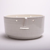 Modigliani inspired Mod Face low bowl molded of glossy white ceramic.