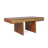 Three drawer Fonda Desk made in oiled African Walnut with a Black Vellum top panel and brass drawers, handles and feet.