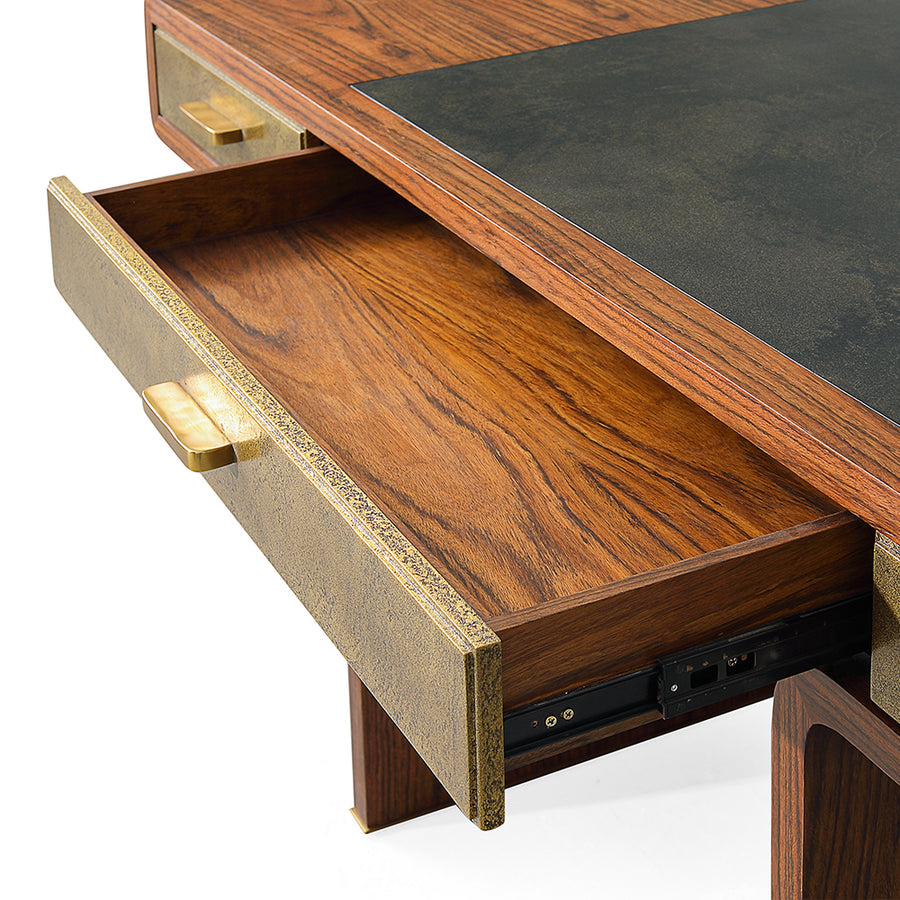 Three drawer Fonda Desk made in oiled African Walnut with a Black Vellum top panel and brass drawers, handles and feet. Closed up view on an open drawer.