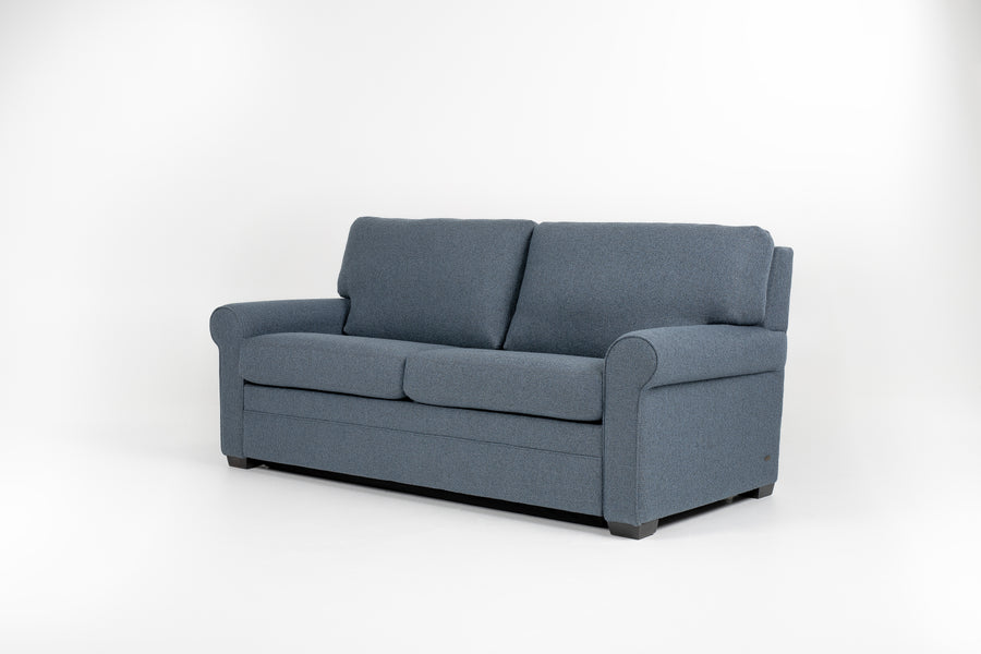 American Leather Gibbs Two Seat Standard (Queen) Comfort Sofa bed in indigo color with high tapered wood legs, front and side view