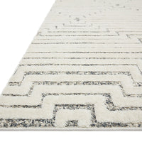 Hagen White Sky Area Rug power-loomed of 100% polypropylene pile with a tone on tone palette offset by strong, yet textural geometric patterns.